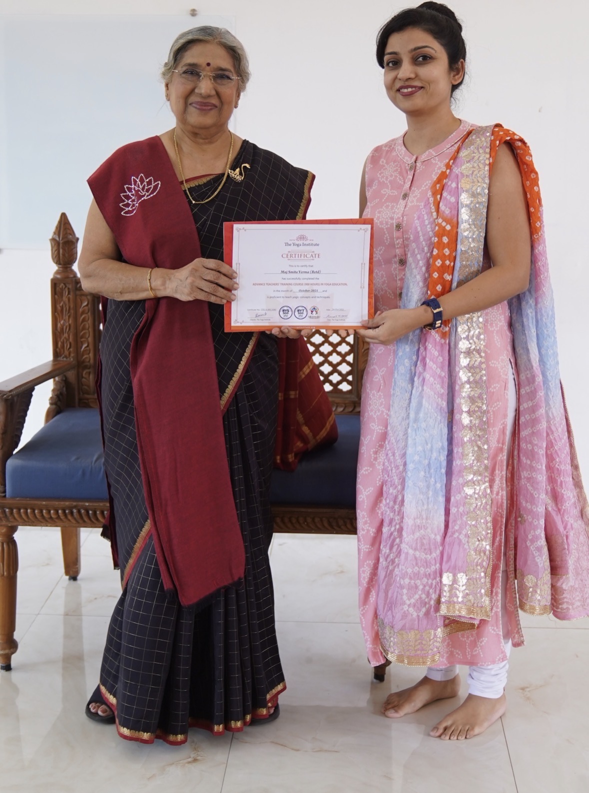 Receiving the advanced teacher training certificate from The Yoga Institute
